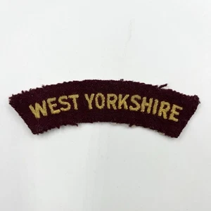 Genuine West Yorkshire Regiment Shoulder Title Yellow On Maroon - Picture 1 of 2