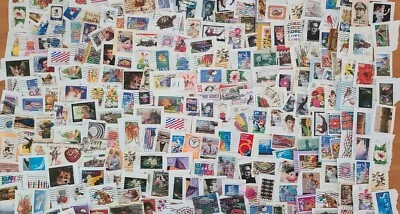1 LB.+ Assorted 3ct Older to Forever Commemorative Stamps USED on Paper Some off - Image 1 of 4
