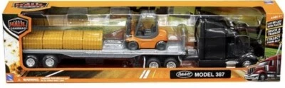 NEW RAY PETERBILT 387 FLATBED W/FORKLIFT & HAY LONG HAUL TRUCKER 1:43 SCALE - Image 1 of 2