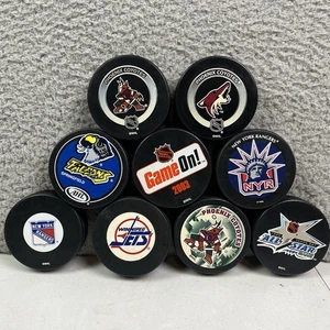 Vintage Hockey Puck Lot 9 Phoenix Coyotes Winnipeg Jets New York Rangers etc. - Bild 1 von 7