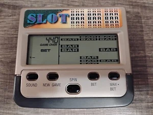 RadioShack Slot Machine Electronic Handheld Game 60-2669 Radio Shack Big Screen - Picture 1 of 5