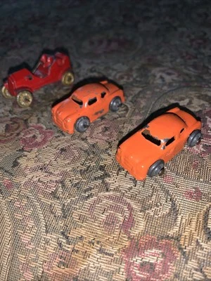 TWO Barclay 1951 Packard Sedan Orange mini Toy Cars Numbered 4 And 5 + Extra Car - Image 1 of 4