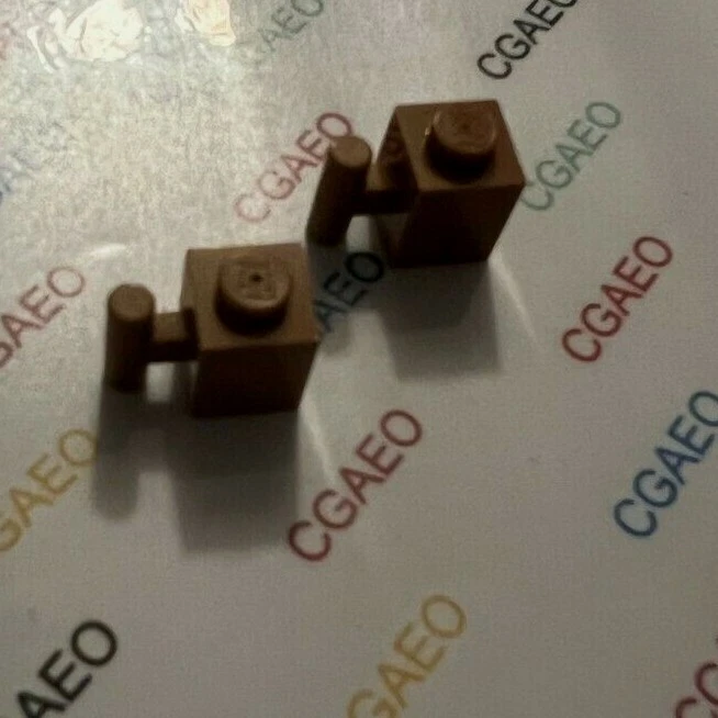 2 X  Lego 2921 Brick, Modified 1 x 1 with Bar Handle  MEDIUM NOUGAT - Photo 1/1