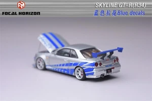 Modellino auto Focal Horizon FH 1:64 Skyline GT-R R34 FNF C-West argento blu pressofuso - Foto 1 di 2