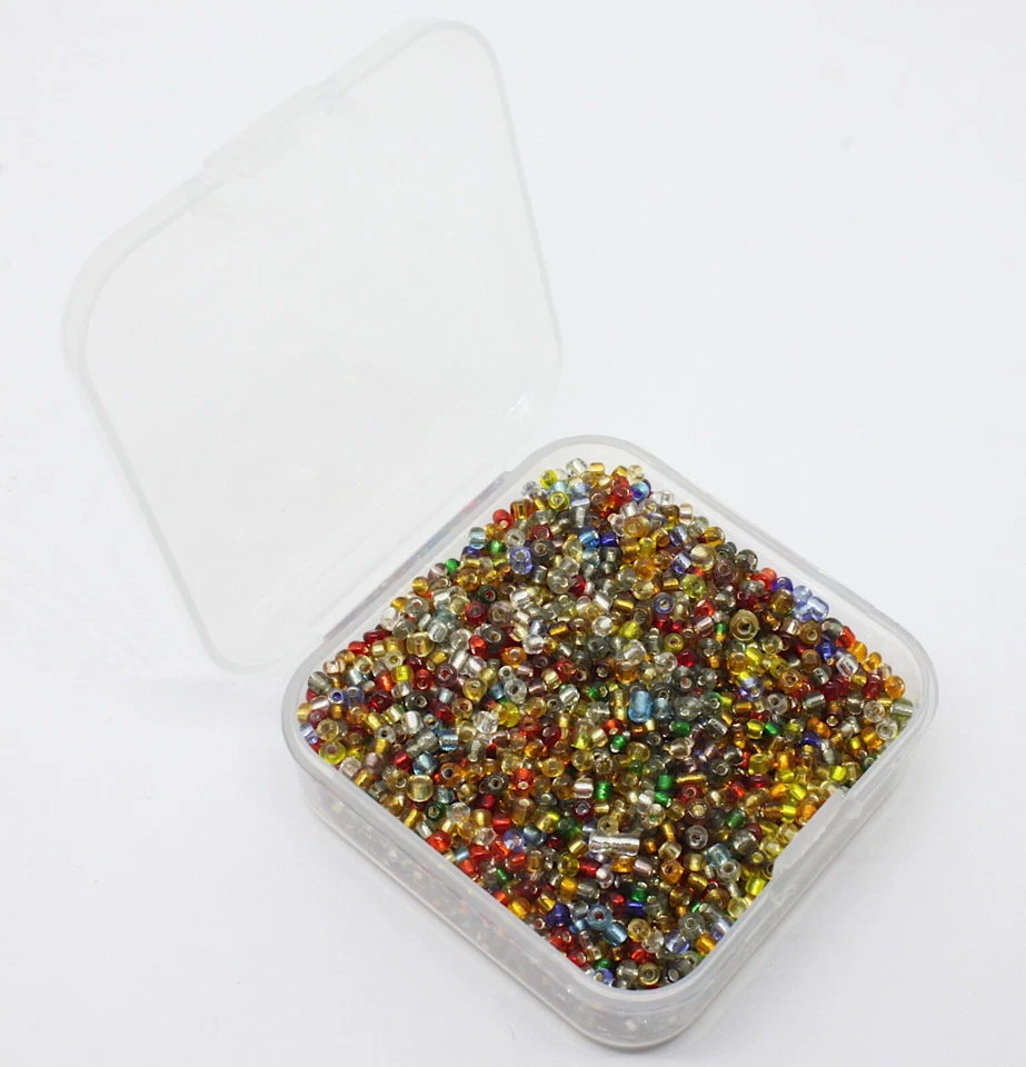 Small box of 50g of 12/0  2mm Foil lined Glass Seed Beads. Apx 330 beads. seed39 - Image 1 of 1