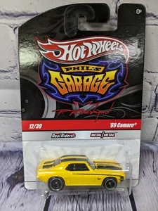Hot Wheels Phil's Garage '69 Camaro gelb #12/39 echte Fahrer Jagd Neu in Verpackung - Bild 1 von 3