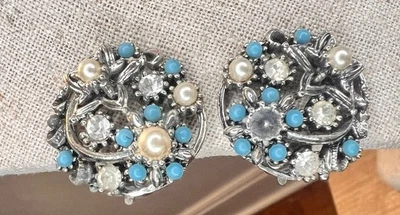 Vintage Signed Star Silver Tone AB Blue Rhinestone Round Floral Clip On Earrings - Image 1 of 4