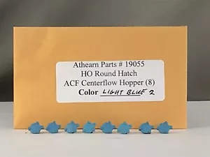 Athearn Parts - 8 Round Hatches for 55' Covered Hopper - # 19055 (Light Blue 2) - Picture 1 of 1