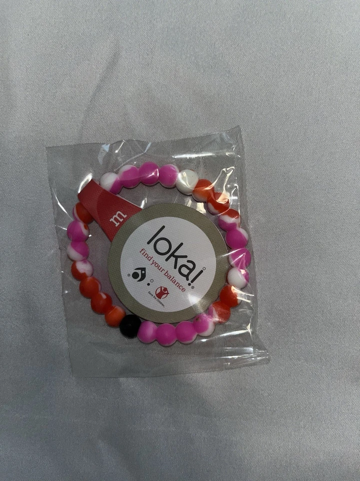 Pulsera Aloha Lokai de silicona rosa mediana surfista hawaiano Foto 1 de 1