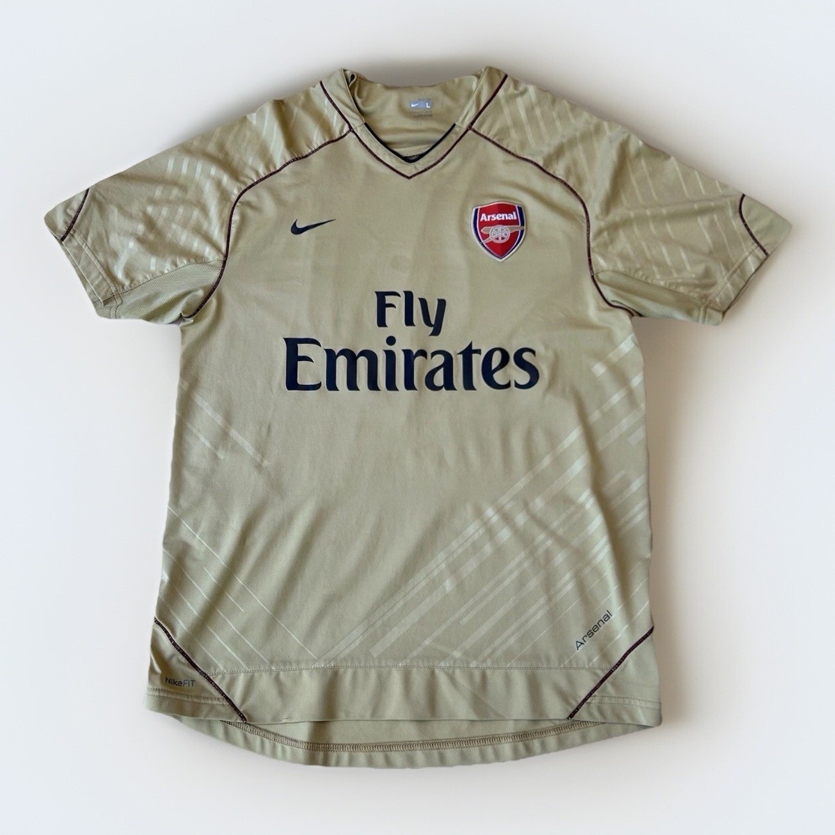 Nike Arsenal Gold International Club Soccer Fan Apparel and Nike Arsenal Gold International Club Soccer Fan Apparel and