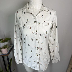 Camisa de esquí de franela manga larga con estampado de botones delanteros estampado de esquiadores pequeños Eddie Bauer para mujer - Imagen 1 de 14