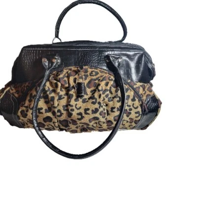 Bolso de fin de semana Travelon 2008 negro estampado de leopardo doble asa cerradura y llave usado en excelente estado  Foto 1 de 4