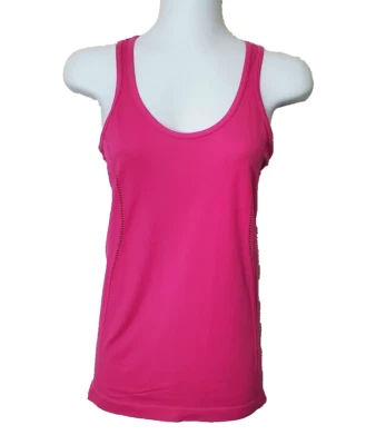 Camiseta sin mangas Fabletics para mujer XS 4 rosa intenso sin cruce ojo de cerradura espalda puntiaguda elástica Foto 1 de 4