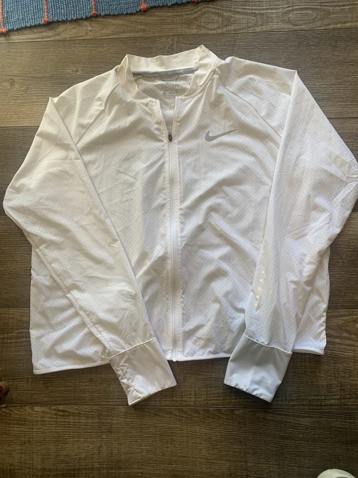 Chaqueta Nike Running Dri-Fit Malla Cremallera Completa Blanca con Logo Plateado Borde Para Mujer’s XL Foto 1 de 4