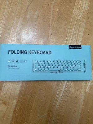 Teclado Plegable Mini Bluetooth NUEVO NUNCA USADO Con Cargador Foto 1 de 4