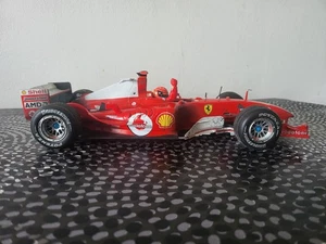 1/18 MATTEL ELITE (NO MINICHAMPS) F1 FERRARI F2004 M. SCHUMACHER #1 DIRT EDITION - Foto 1 di 8