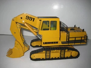 LIEBHERR R 991 BAGGER HOCHLÖFFEL RAUPEN #2824.2 CONRAD 1:50 - Picture 1 of 1