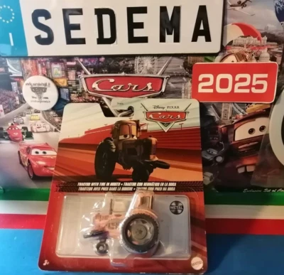 Cars1 TRACTOR with Tire in Mouth SerieTrib.Red Bl.2021 Bl. sing.Mattel 1/55metal - Immagine 1 di 2