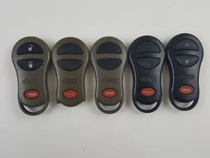 LOT OF 5 ORIGINAL JEEP GRAND CHEROKEE 99-04 KEY LESS ENTRY REMOTE PANIC OEM FOB - Picture 1 of 15
