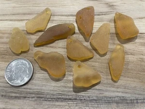 Seeglas - 10 kleine oben gebohrte Stücke Bernstein / Orange Seeglas - Bild 1 von 2