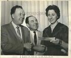 1965 Press Photo Claire M. Robin, Director, Holman Vocational Center, With Check