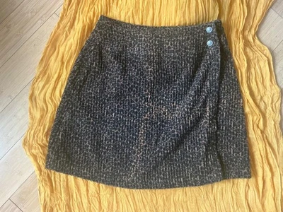 Minifalda elegante vintage con textura de pana gruesa estampado animal guepardo de leopardo Foto 1 de 4