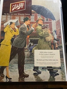 Vintage 1951 Schlitz Beer First In Sales Man Holding Umbrella ad - Picture 1 of 1