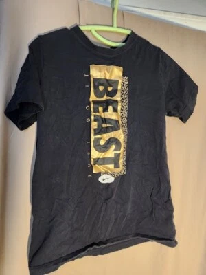 Camiseta Nike Beast dorada y negra XL para niños Foto 1 de 2
