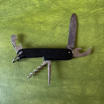 Cuchillo multiherramienta vintage negro alemán hoja plegable bolsillo ejército suizo acero antiguo Foto 1 de 4