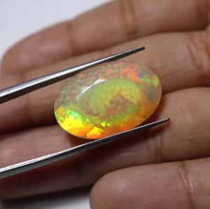 11.5 Carat Amazing Color Natural Multi Fire Ethiopian Opal Oval Cut 21.4x14.4 MM - Picture 1 of 24