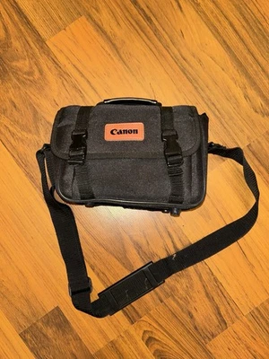 Bolso de hombro vintage de lona negra y tostada para cámara Canon con correa ajustable Foto 1 de 3