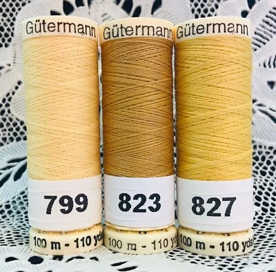 3 NEW  Yellow gold colors GUTERMANN 100% polyester thread 110 yard spools - Image 1 of 4