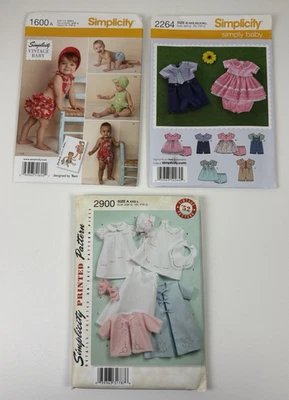 Lot of 3 Simplicity Baby Clothes Sewing Patterns 1600, 2264 & 2900 UNCUT and FF - Image 1 of 4