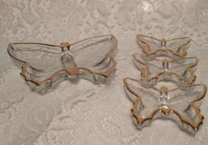 Juego de 4 platos de almacenamiento de caramelos vintage de vidrio dorado con forma de mariposa - Imagen 1 de 12