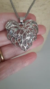Silver Tone Cut out Heart Pendant with Floating Crystals - Picture 1 of 3