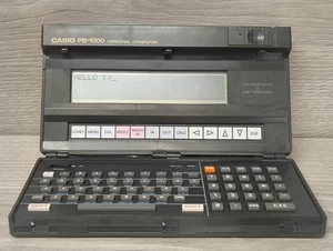Computadora personal de bolsillo vintage CASIO PB-1000 probada funcionando - Imagen 1 de 14