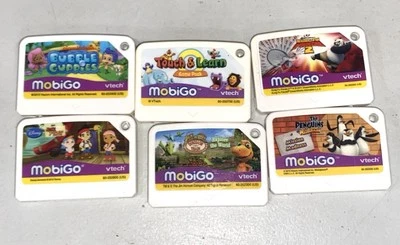 VTech MobiGo Game Cartridge Lot 6 Jake Neverland Pirates Bubble Guppies Penguins - Image 1 of 4