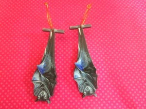 Orecchini a pipistrello in legno grossi updie down - Foto 1 di 3