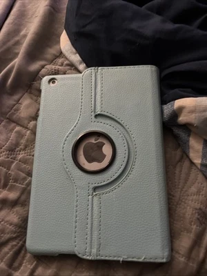 iPad Mini 2 con funda usado Foto 1 de 2