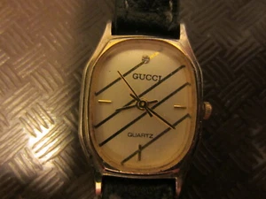 Gucci ladies watch.Diamond&stripe's on face.Origonal Leather band.Runs fine. - Picture 1 of 4