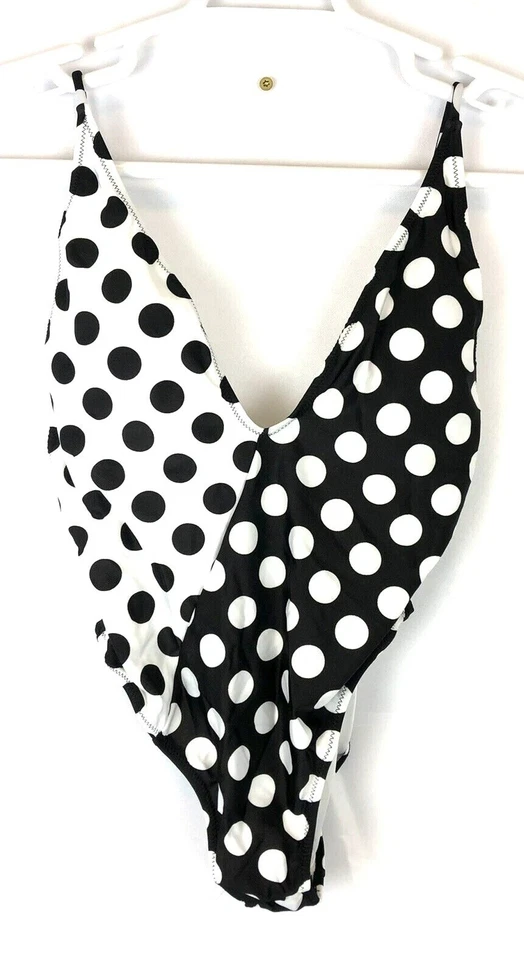 Traje de baño Volcom de una pieza a lunares con cuello en V para mujer talla pequeña Foto 1 de 4
