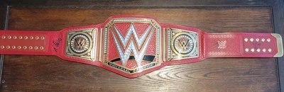 WWE Universal Championship Replica Title Belt Red Autographed by 3 Superstars. - Image 1 of 4