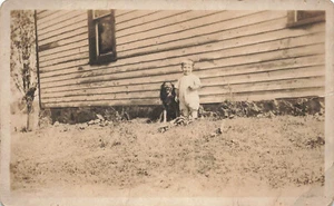 RPPC REAL PHOTO YOUNG CHILD POSES WITH SMILING DOG c1910 POSTCARD 091224 T - Picture 1 of 3