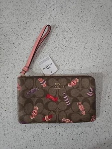 Coach grande braccialetto con zip angolare in tela firmato con stampa caramelle C1892 - Foto 1 di 5