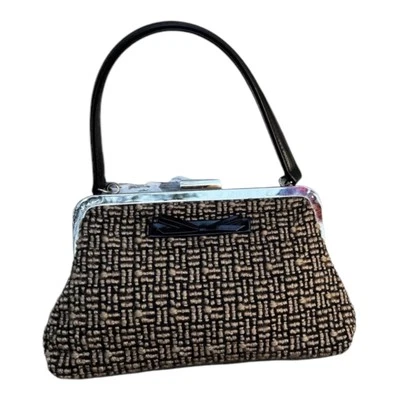 Bolso de mano Sak Elliot Lucca inspirado vintage en tweed con arco. Foto 1 de 4