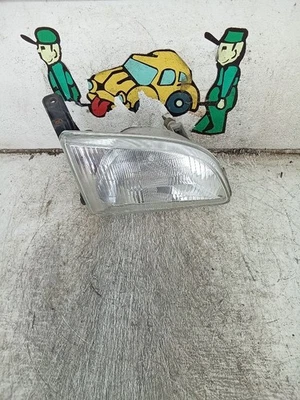 Faro Toyota Sienna 2000, lado del pasajero (RF) OEM  Foto 1 de 2