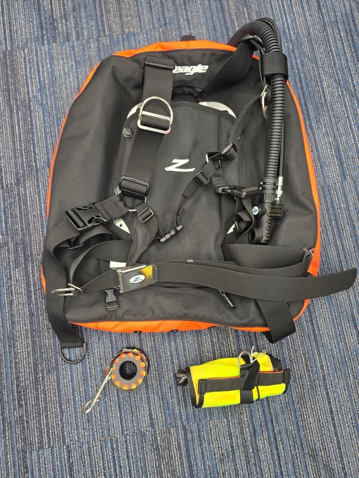 Placa posterior Zeagle 40 lb con carrete de 150’ y tubo de fabricación desplegable de lujo Foto 1 de 1