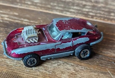 Coche de juguete original vintage Johnny Lightning Jumpin Jag magenta 1970 Foto 1 de 4