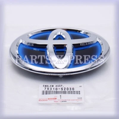 REJILLA RADIADOR DELANTERO EMBLEMA AZUL ORIGINAL OEM TOYOTA PRIUS C 2015-19 75310-52030 Foto 1 de 4