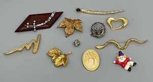 Lote lotes - bisutería - 10 broches y 1 pin - entre otros Serpiente Hoja Payaso - Imagen 1 de 3